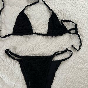 Black brand new micro swimsuit